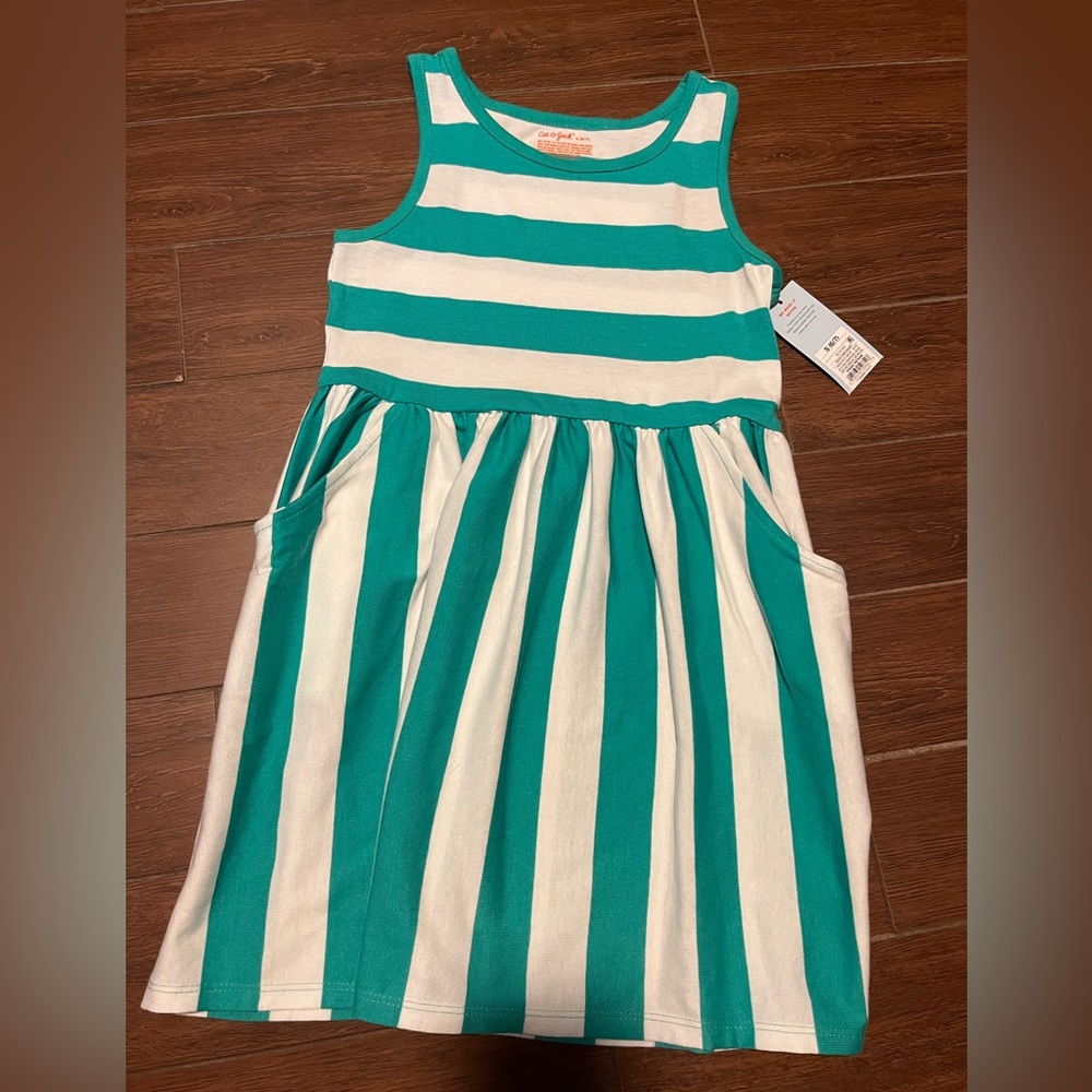 Size 6-7 Cat and Jack stripped dress with pockets. NWT